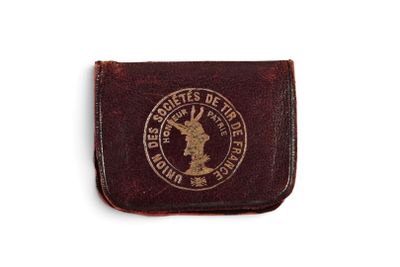 un portefeuille en cuir marron orné du blason de l'État du Texas