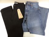 two pairs of black and blue jeans sitting on top of each other