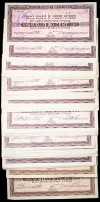 several bills stacked on top of each other on a black background