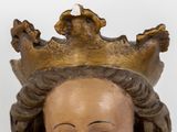 a statue of a woman with a crown on her head