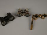 a close up of three different types of brass fittings on a table