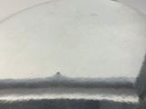 a close up of a metal object on a table