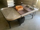 two trays on a table in a warehouse