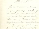 une vieille lettre manuscrite sur laquelle figure la photo d'un homme