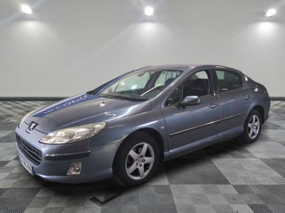 a picture of a car that is parked in a garage