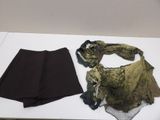 two pieces of clothing that are on a table