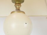 an image of a lamp that is on top of a table