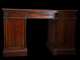 an image of a desk with a wooden top and a black background