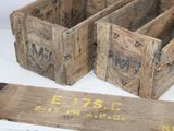 two wooden crates sitting next to each other on a table
