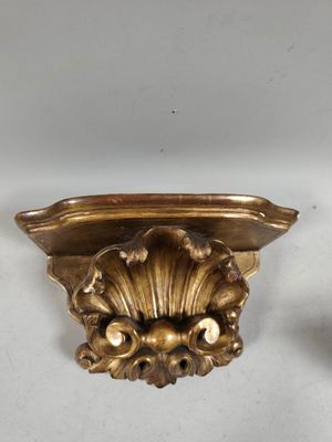 pair of antique brass wall sconces with a lion head
