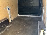 a van that is parked inside of a building