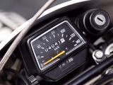 a close up of a motorcycle with a speedometer on it ' s handlebar