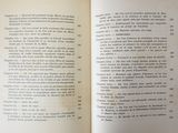 an open book with a page in it on a table