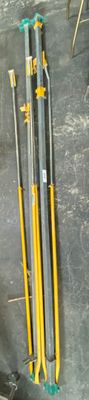 four poles that are sitting next to each other on the floor