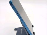 a cell phone that is sitting on top of a stand