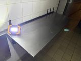 a light that is on top of a metal counter
