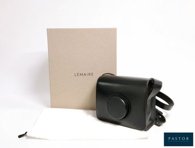 a picture of a black leather camera case and a white cloth