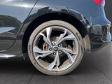 a close up view of a car ' s wheel and tire