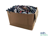 a cardboard box filled with assorted items on a white background