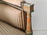 a chair that has a chain on the back of it