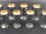 a lot of candles that are sitting on a table