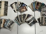 a lot of old photos that are on the floor