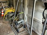 a ladder that is leaning against a wall in a garage