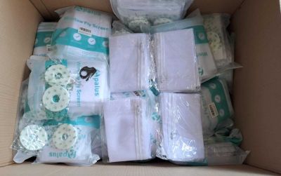 a box full of diapers and other items in it