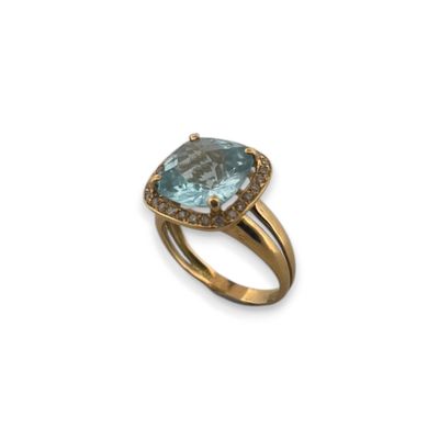 Jolie bague en or jaune 18K (750) sertie à griffes d'une aig…