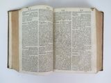an open book that is sitting on a table