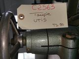 a label on the handle of a machine that has a price tag attached to it