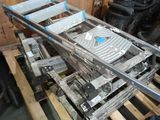 an image of a pile of assorted metal items on a pallet