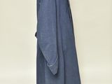 blue wool coat on a mannequin stand