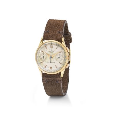 an 18k yellow gold chronograph wrist watch