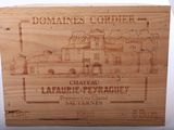 a wooden box with a drawing of a building on it
