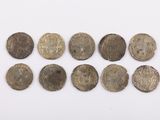 a group of five silver coins