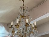 a chandelier hanging from the ceiling in a store