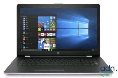 a laptop with windows on the screen and windows on the screen