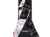a black and white tie with a red and white design