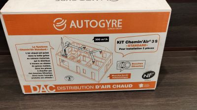 an orange and white box with a picture of an autoglyre on it
