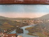 a picture of a picture of a town and a river