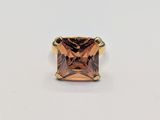 an image of a ring with a square cut brown diamond