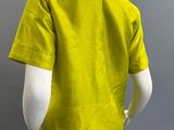 the back view of a mannequin wearing a yellow shirt and black pants