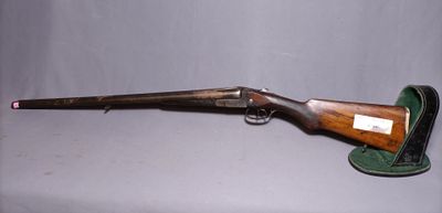 a rifle that is sitting on top of a table