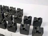 many pieces of metal that are sitting on a table