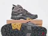 a close up of a pair of shoes on top of a box