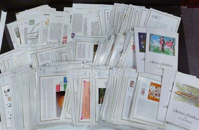 a lot of books that are sitting on a table