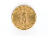 an image of a gold coin on a white surface