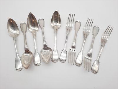 a lot of silver spoons and forks on the table