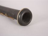 a pipe that is sitting on a white surface